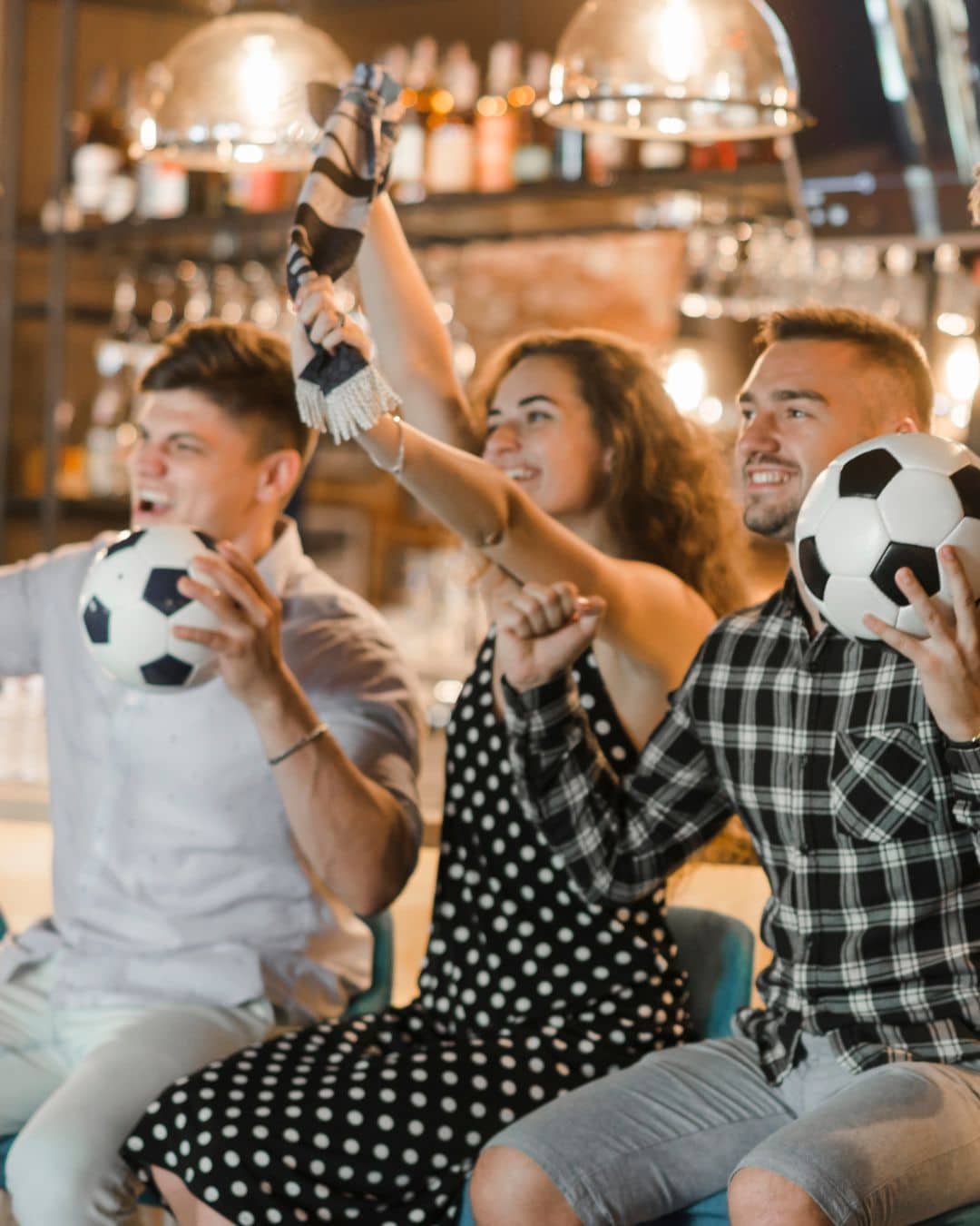 Cheering for the football at a bar